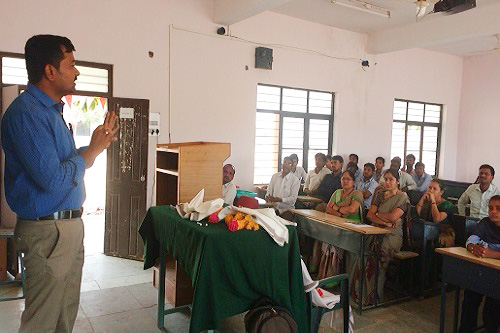 Veterinarian giving awareness talk on Rabies in a Degree College students and staff